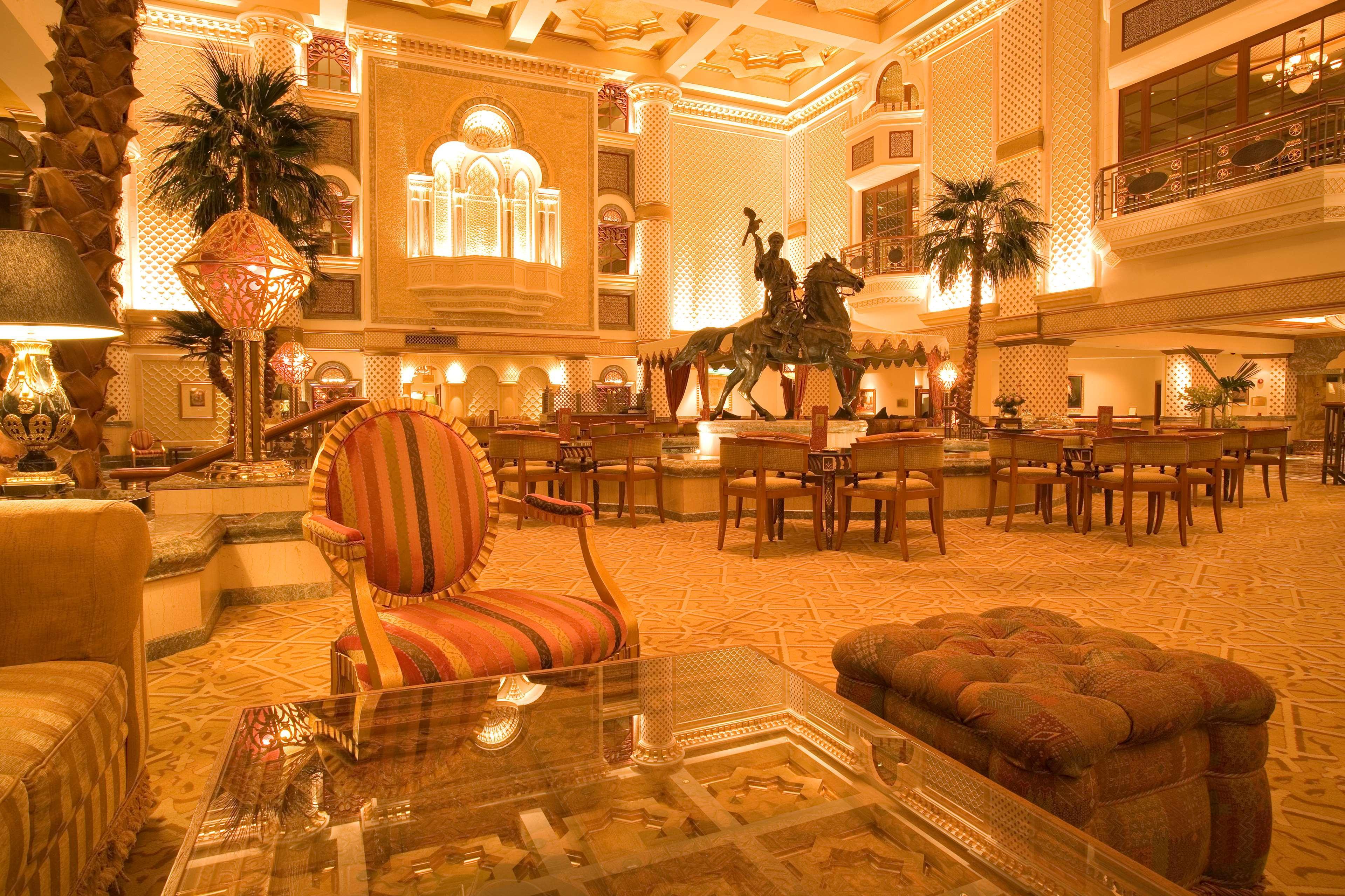 Grand Hyatt Muscat Hotel Exterior photo The lobby of the Taj Mahal Palace Hotel