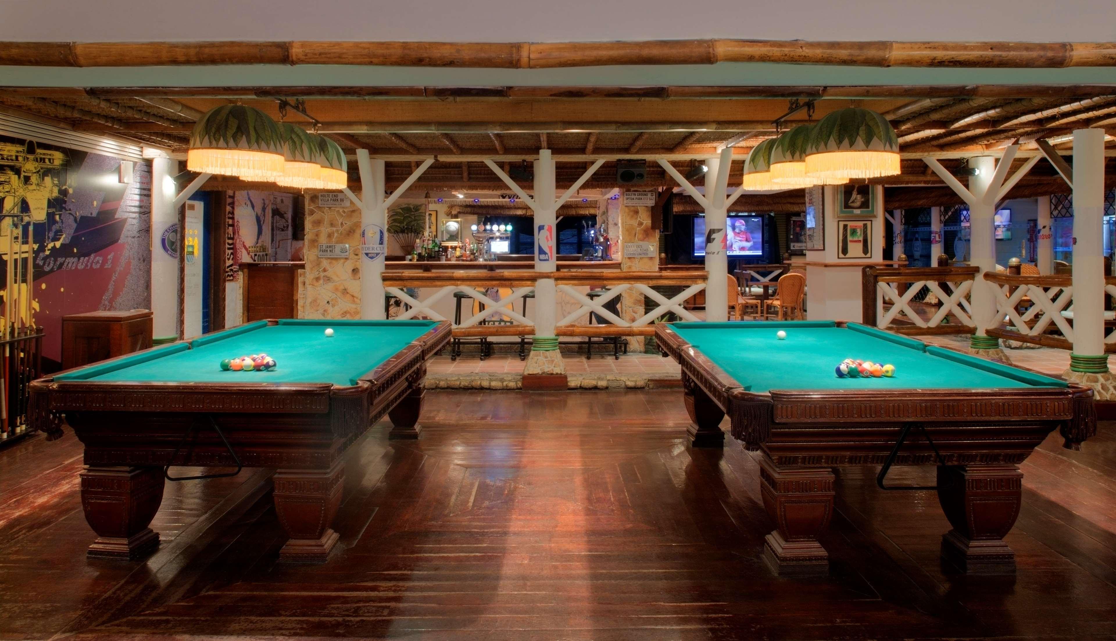 Grand Hyatt Muscat Hotel Exterior photo Pool tables at a pool hall