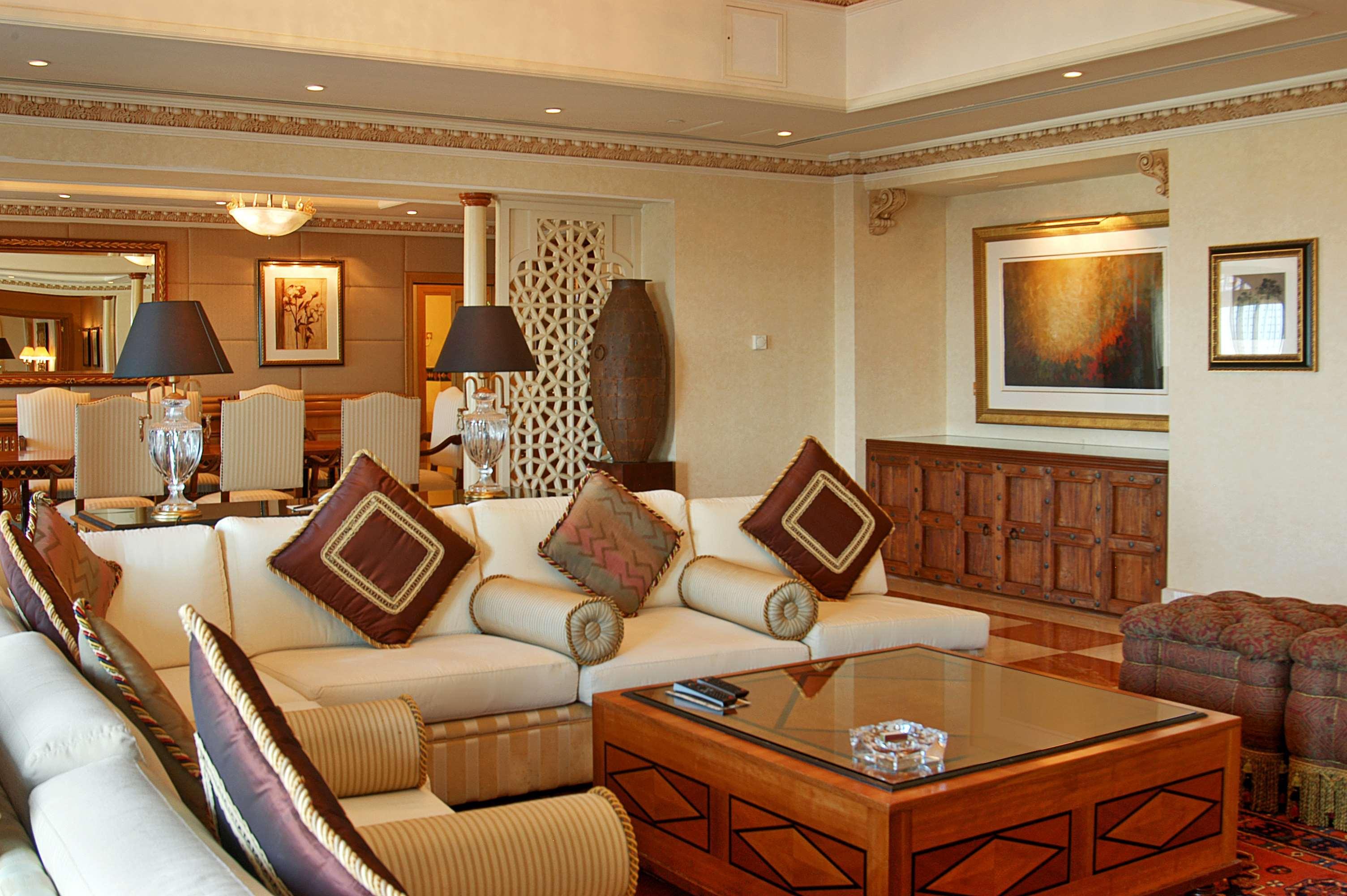 Grand Hyatt Muscat Hotel Exterior photo A living room in a suite at the Burj Al Arab